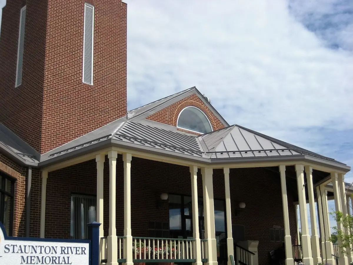 Skilled roofing craftsmen working on a residential roof in Five Points